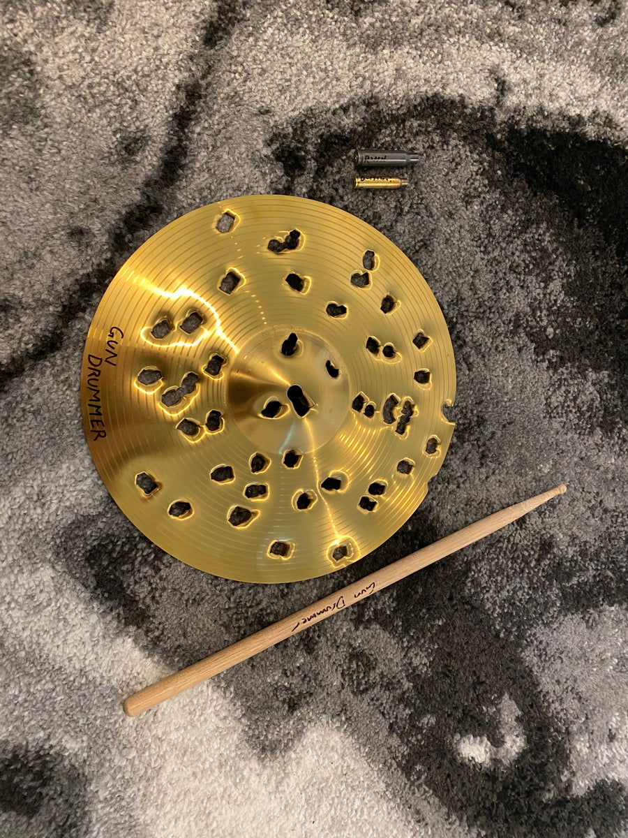 Bullet Riddled Cymbal and Drumstick Combo Gun Drummer